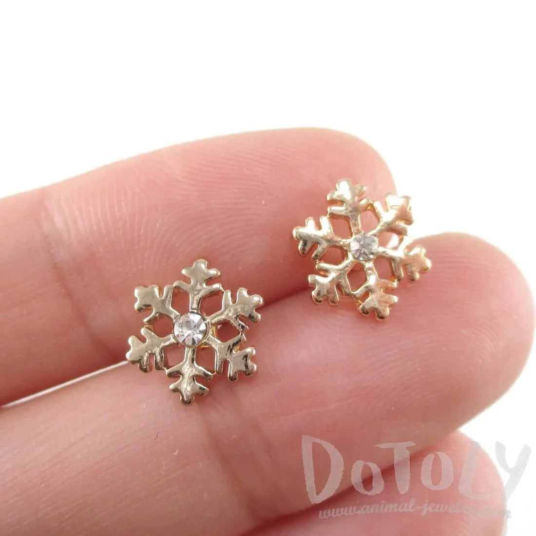 Small Snowflake Shaped Stud Earrings in Gold with Rhinestones | DOTOLY