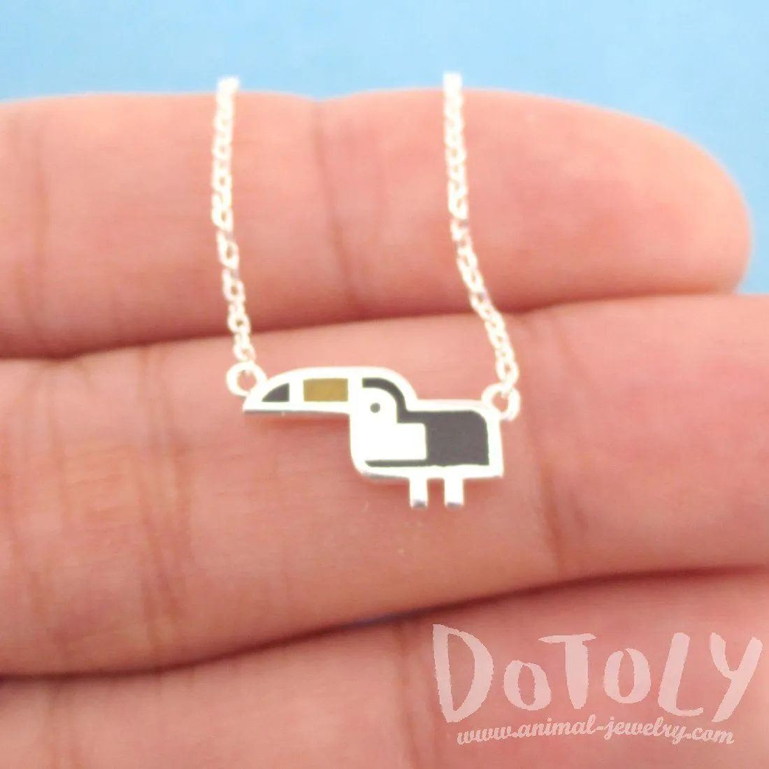 Tiny Atlantic Puffin Bird Shaped Enamel Charm Necklace in Silver | DOTOLY