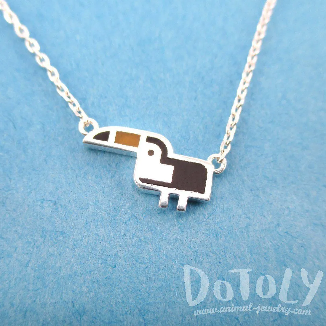 Tiny Atlantic Puffin Bird Shaped Enamel Charm Necklace in Silver | DOTOLY